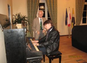 After the concert, Grzegorz Niemczuk played on an antique piano from the early 1880s.  Photo by Zenobia Kulik.